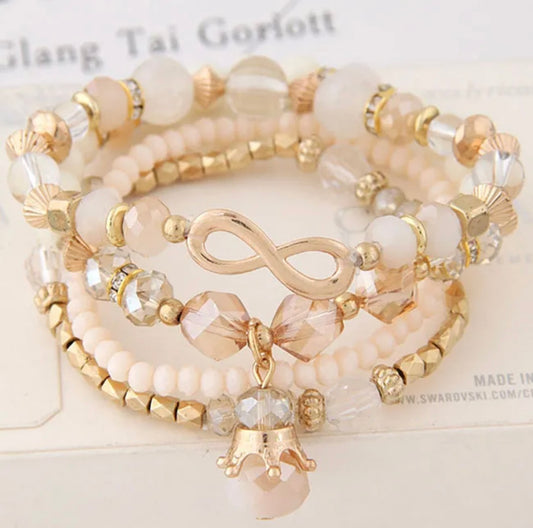 Off White 4 Piece Stretch Jeweled Bracelet Set