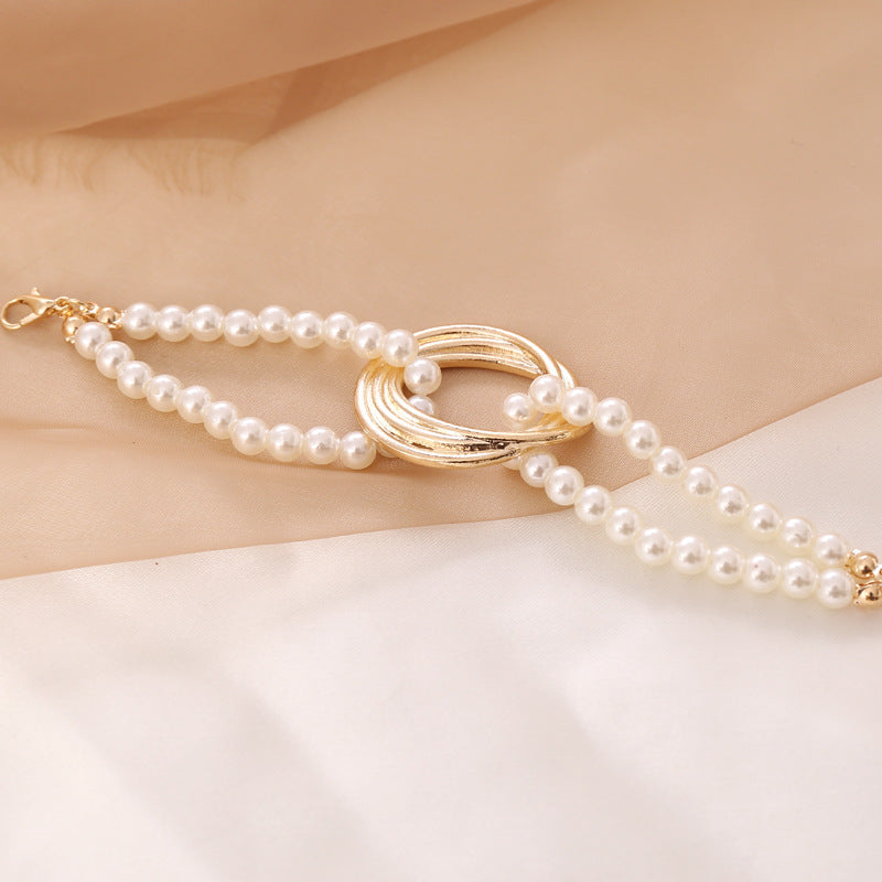 Faux Pearl and Gold Statement Bracelet
