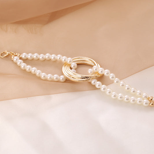 Faux Pearl and Gold Statement Bracelet